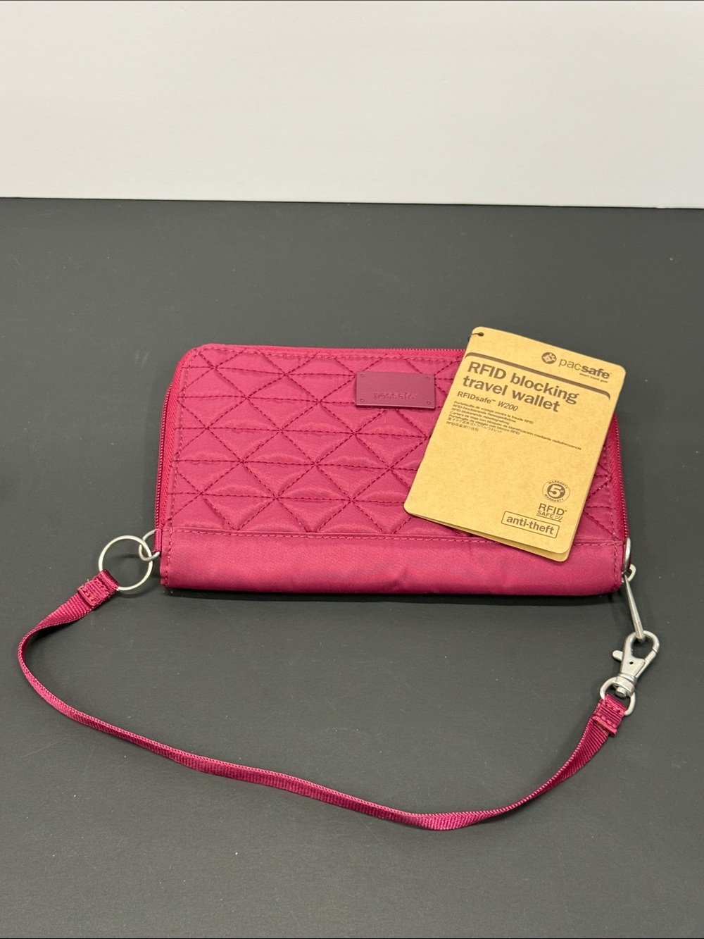 Pacsafe RFID-Blocking Wristlet Wallet in Magenta